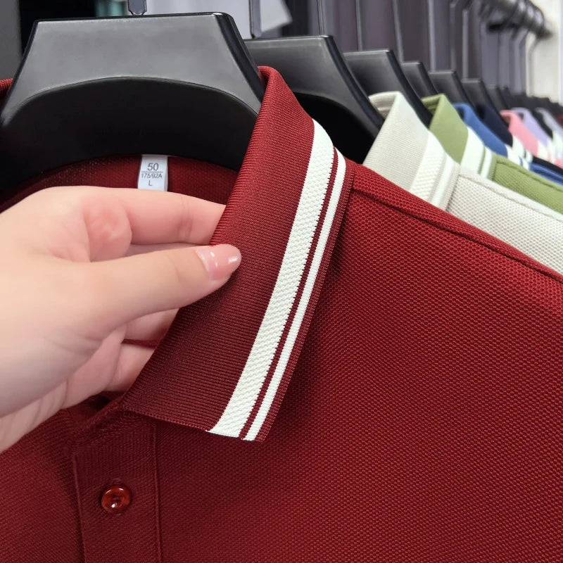 Men's short sleeve polo shirt in deep red with white striped collar and breathable cotton fabric.