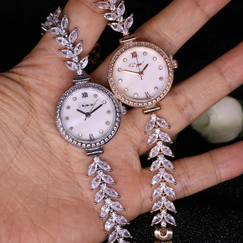 TrendLux Women's Crystal Claw-Setting Luxury Quartz Jewelry Bracelet Wristwatch