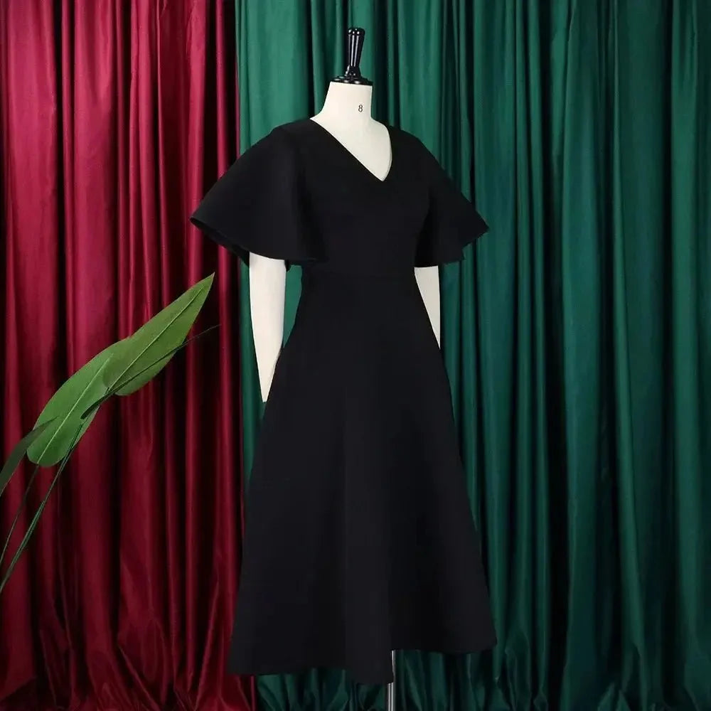 Women's high waist flare sleeve pleated A-line midi dress by The Glow Sanctuary, featuring a stylish polyester design.