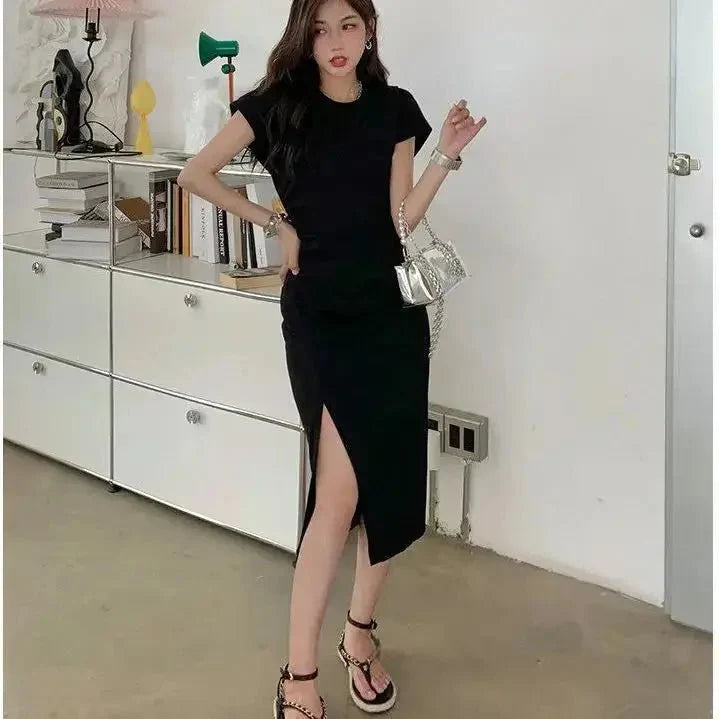 Y2K asymmetrical hem midi dress by The Glow Sanctuary featuring a stylish street style look with a modern, effortless design.