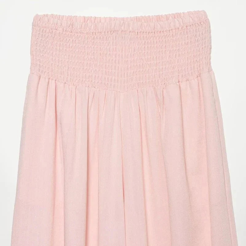 Women's pink high waist wide leg balloon pants by TrendLux Wear, featuring a flowy, relaxed fit and stylish design.