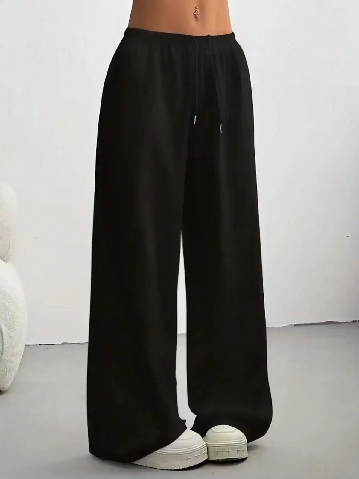 Ladies' casual wide-leg jogging pants by TrendLux Wear, featuring a relaxed fit and comfortable fabric, shown in a stylish modern design.