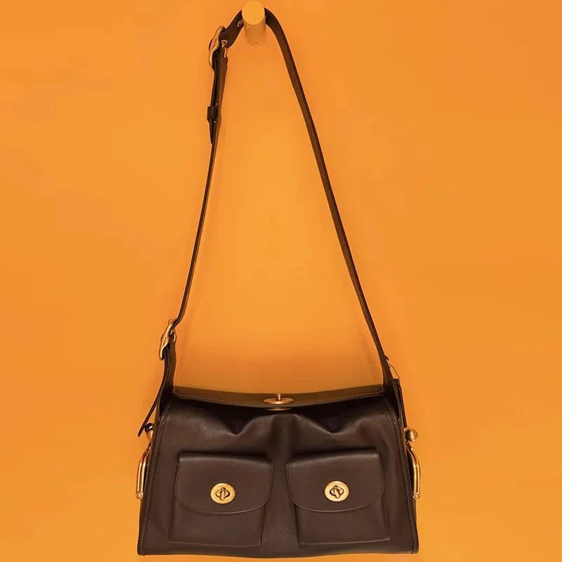Women's vintage leather handbag by TrendLux Wear with large capacity, featuring a classic design and sturdy leather construction.