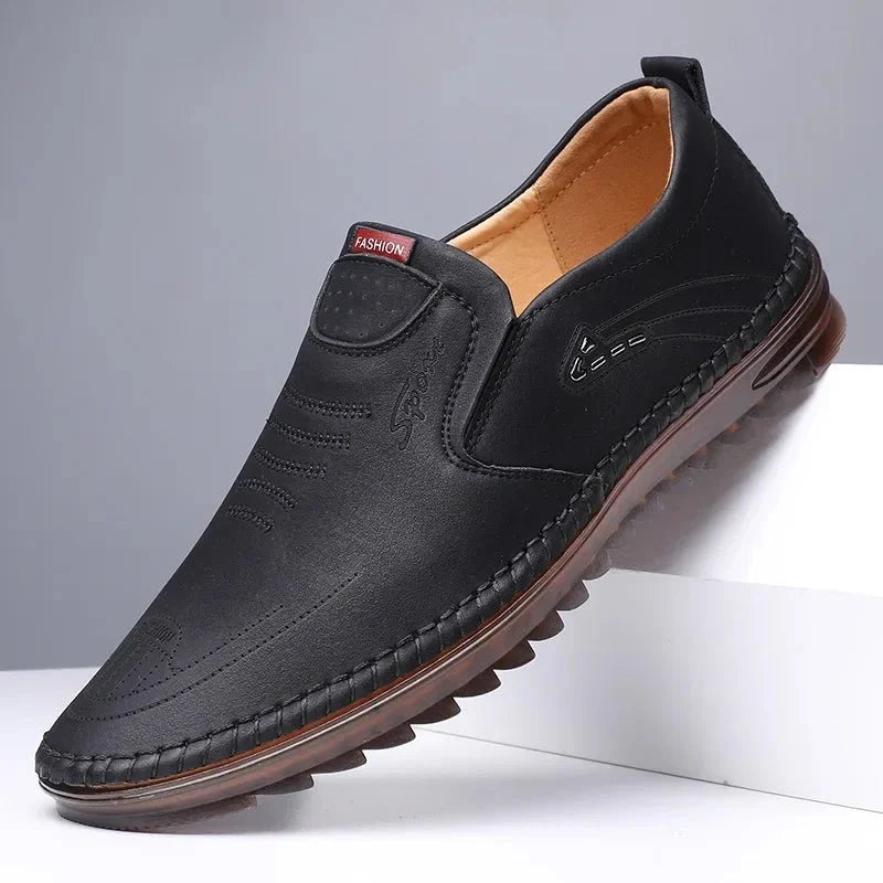 Men's handmade PU leather moccasin sneakers with soft soles, breathable casual loafers for men by TrendLux Wear.