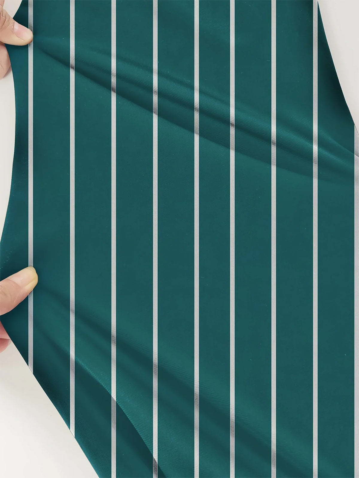 Men's straight-leg casual trousers in dark teal with vertical silver stripes, featuring a soft polyester blend.