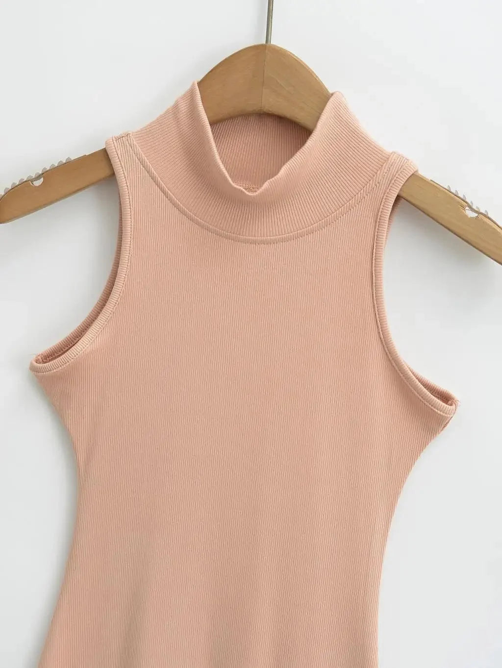 Women's knit turtleneck bodycon ankle-length maxi dress by The Glow Sanctuary, featuring a fitted silhouette and cozy knit fabric.