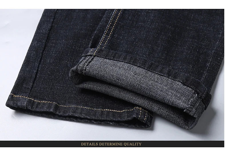 Men's slim fit black biker jeans by TrendLux Wear, classic straight leg design, size 32, showing front view with detailed stitching.