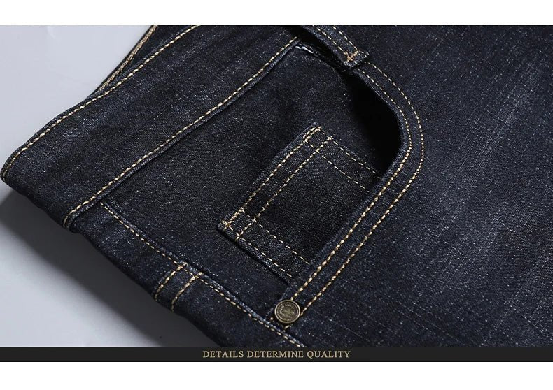 Men's slim fit black biker jeans by TrendLux Wear with straight leg design, available in sizes 30 to 38.