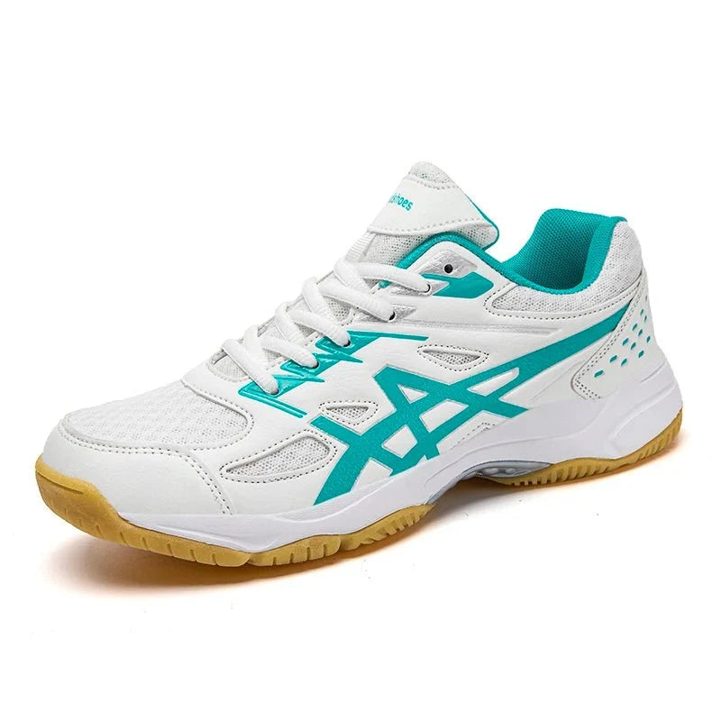 Unisex TrendLux Wear anti-slip court sneakers for badminton and table tennis, featuring a sleek athletic design and supportive soles.