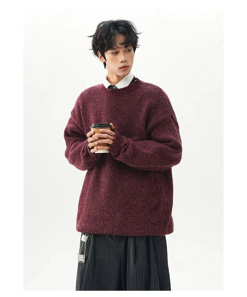 Men's oversized round neck pullover sweater from TrendLux Wear in warm polyester knit, available in three colors.