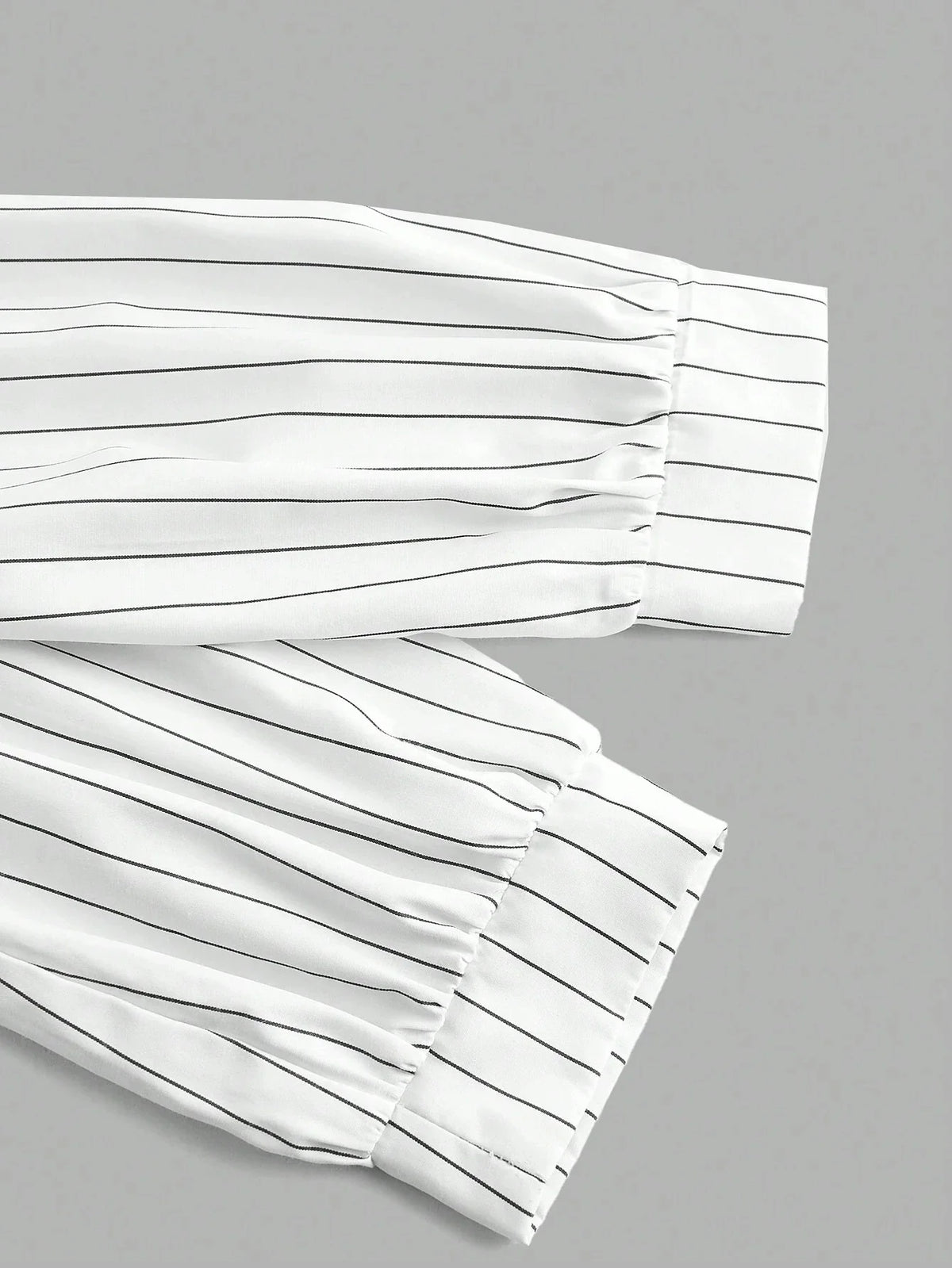 Women's stripe 2-in-1 cropped shirt by TrendLux Wear featuring a V-neck, lantern sleeves, perfect for spring and fall.