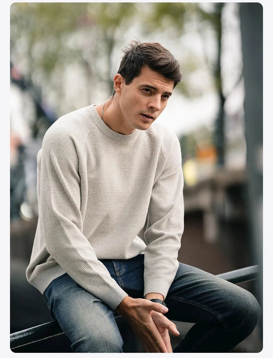 Men's oversized waffle-knit crewneck sweater in Heather Denim Blue from TrendLux Wear, casual pullover with textured knit fabric.