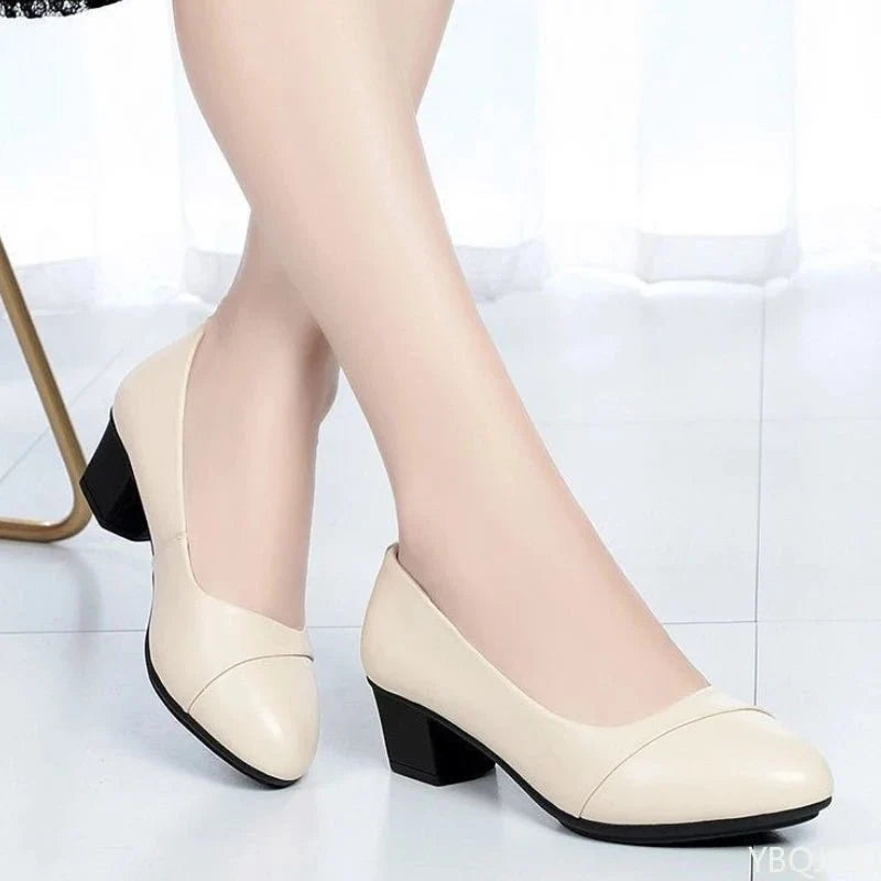 Women's TrendLux Wear mid heel slip-on pumps with round toe, perfect for office work and professional attire.