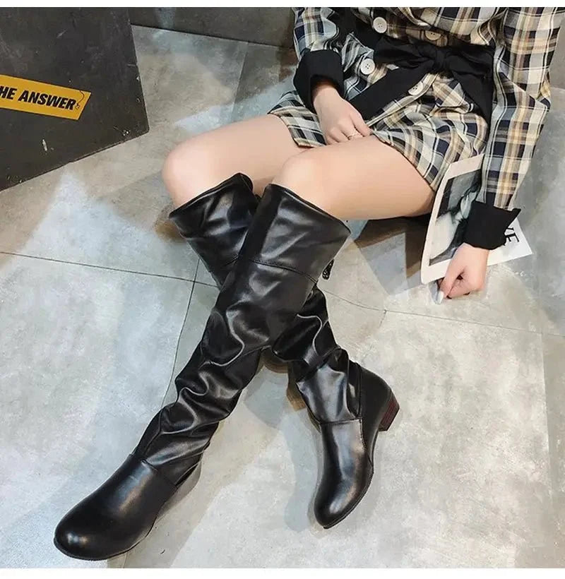 Women's knee-high lace-up boots with pleated design from TrendLux Wear, featuring a stylish shoe silhouette and textured details.
