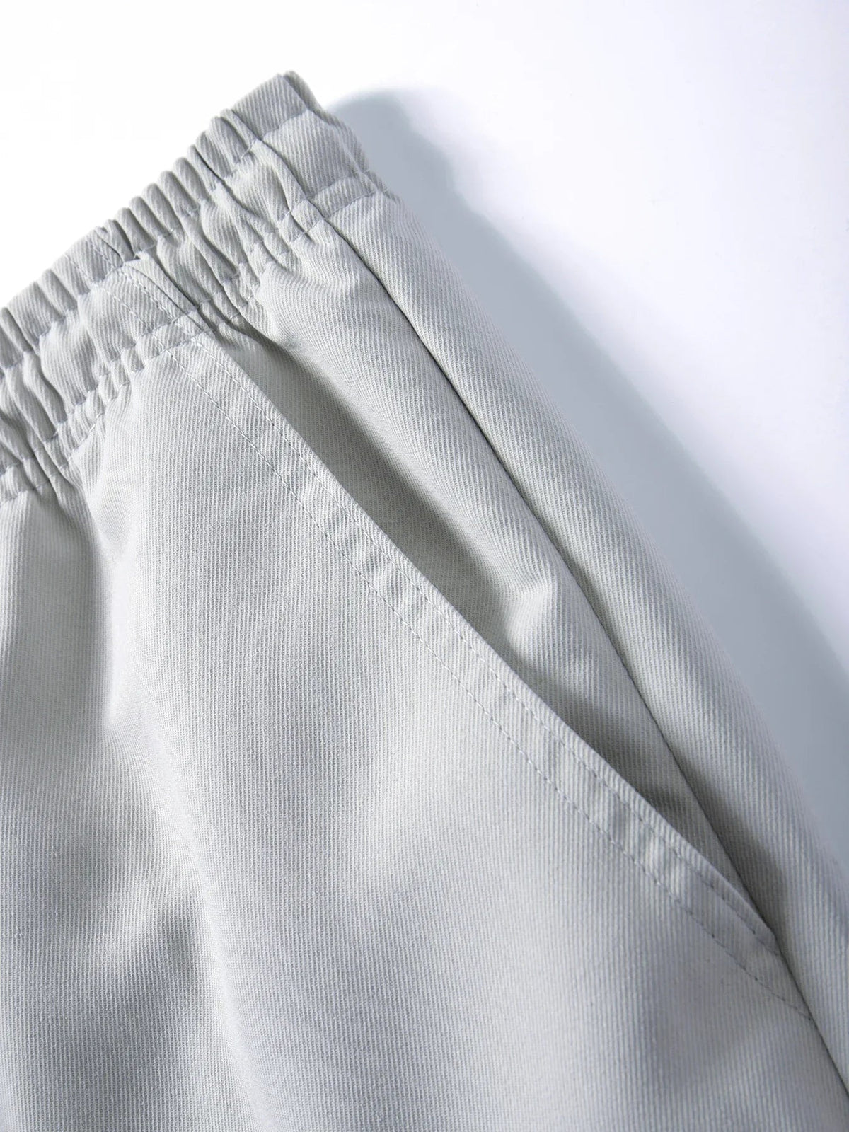 Men's tactical cargo pants by TrendLux Wear, loose fit outdoor jogger sweatpants with multiple pockets in various colors.