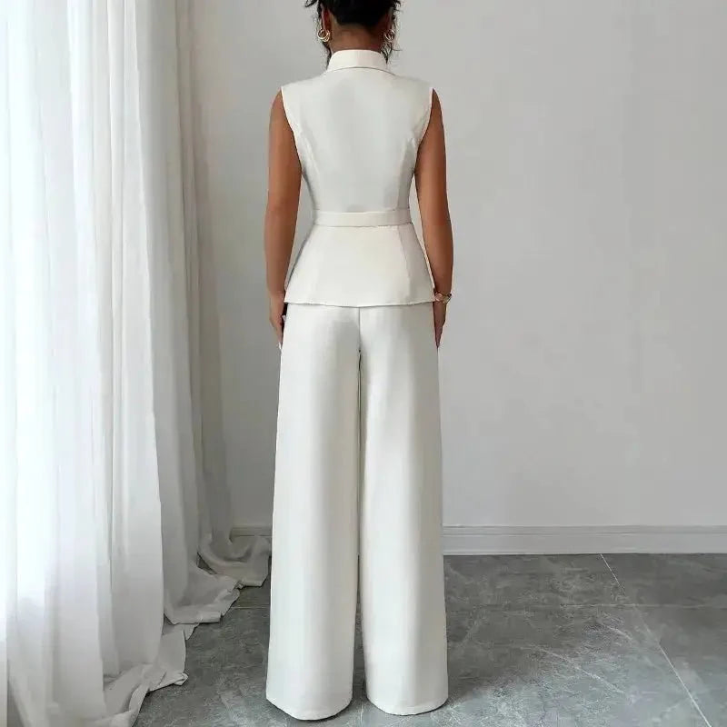 Women's spring sleeveless two-piece suit by TrendLux Wear, featuring a stylish blazer and matching pants.