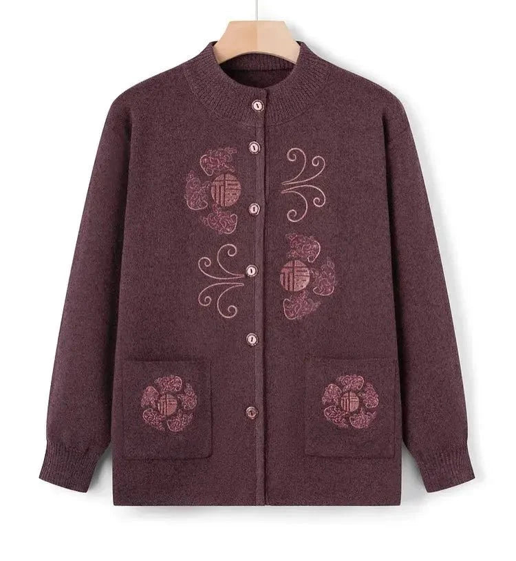 Women's vintage printed knit cardigan coat from TrendLux Wear, featuring a cozy knitwear design with colorful patterns.