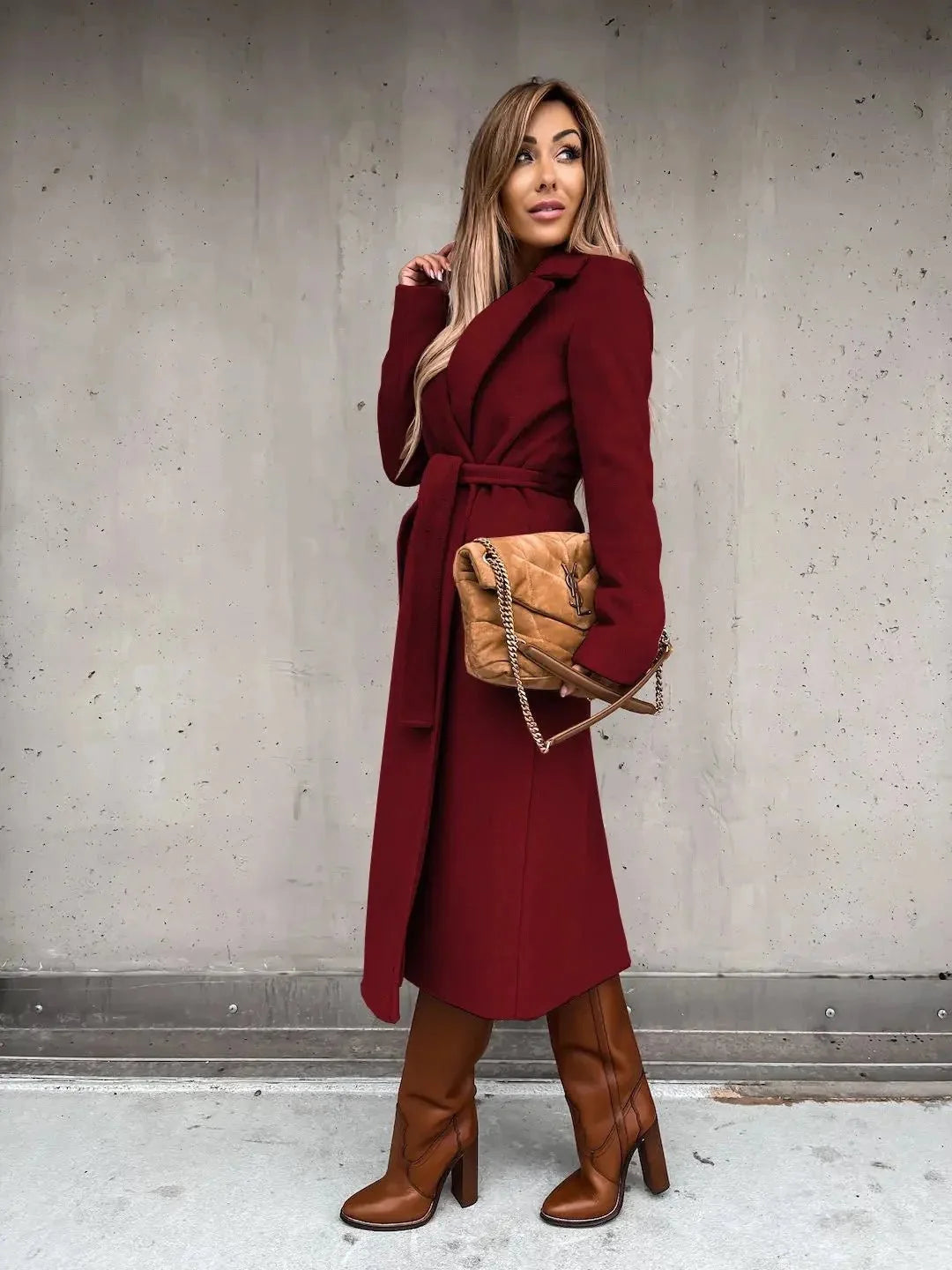 Women's solid woolen lapel coat by TrendLux Wear, featuring a classic outerwear design with a tailored fit and cozy wool fabric.