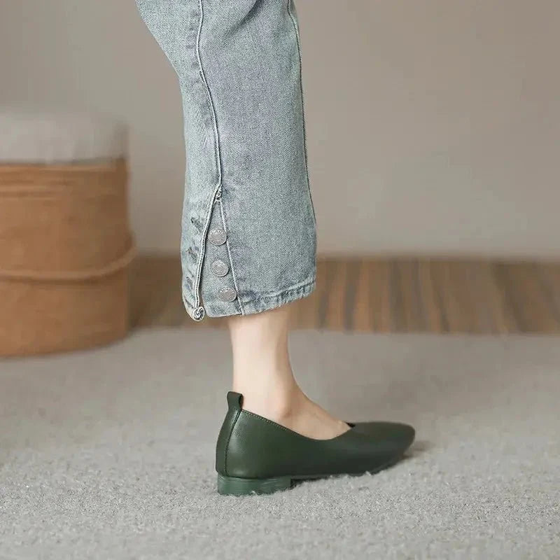 Women's round-toe leather loafer flats by TrendLux Wear, showcasing stylish black shoes with smooth leather finish.