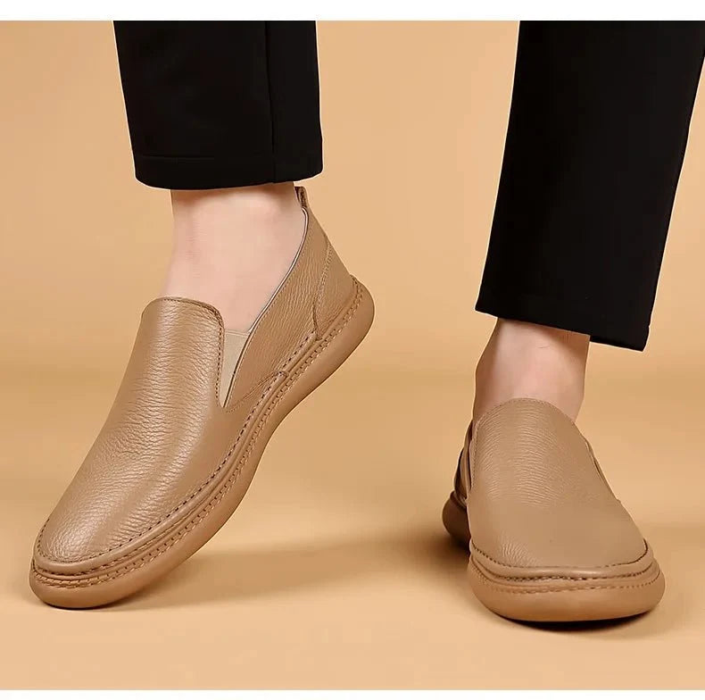 Men's genuine leather casual loafers by TrendLux Wear, breathable slip-on flat shoes in solid color, stylish and comfortable.