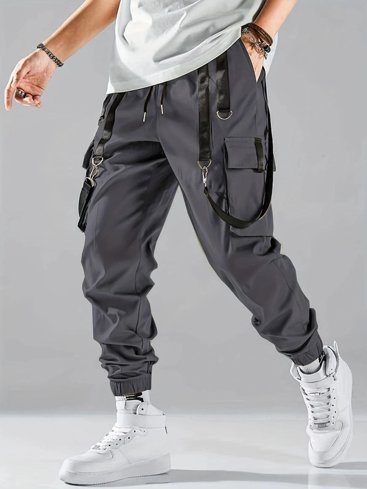 Men's Techwear Cargo Joggers by TrendLux Wear featuring drawstring waist, multiple pockets, and a modern hip hop style in various colors.