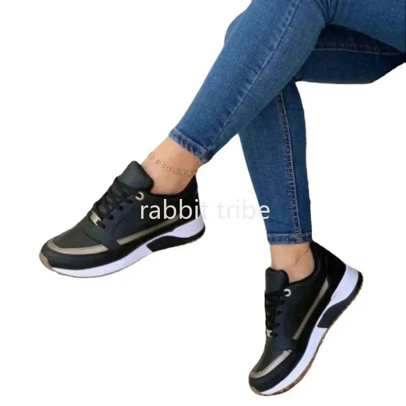 Women's lace-up casual sneakers by TrendLux Wear featuring height-increasing design and comfortable sneaker style.