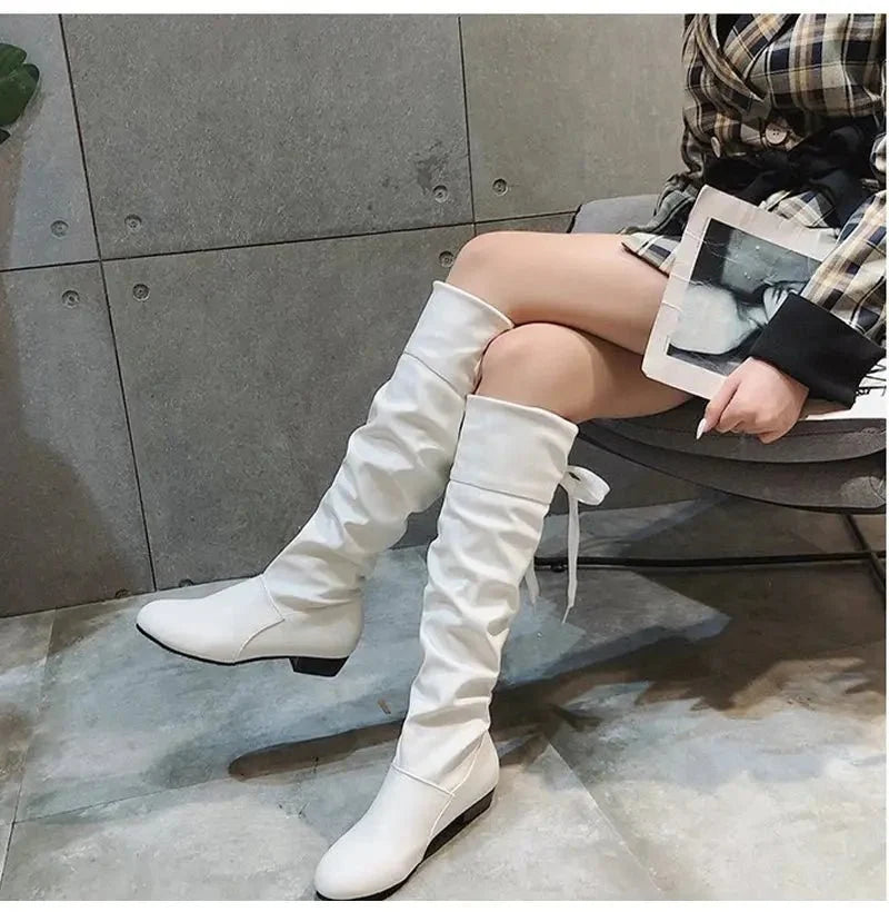 Women's pleated lace-up knee-high boots from TrendLux Wear, stylish shoes with a pleated design and lace-up front.