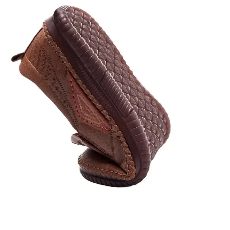 Men's genuine leather slip-on loafer sneakers by TrendLux Wear, featuring a breathable soft sole and casual moccasin design.