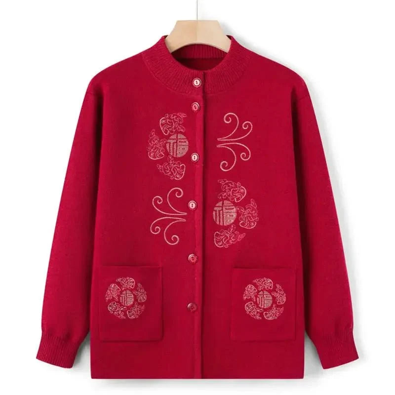 Women's vintage printed knit cardigan coat by TrendLux Wear, featuring a cozy knitwear design with colorful floral pattern.