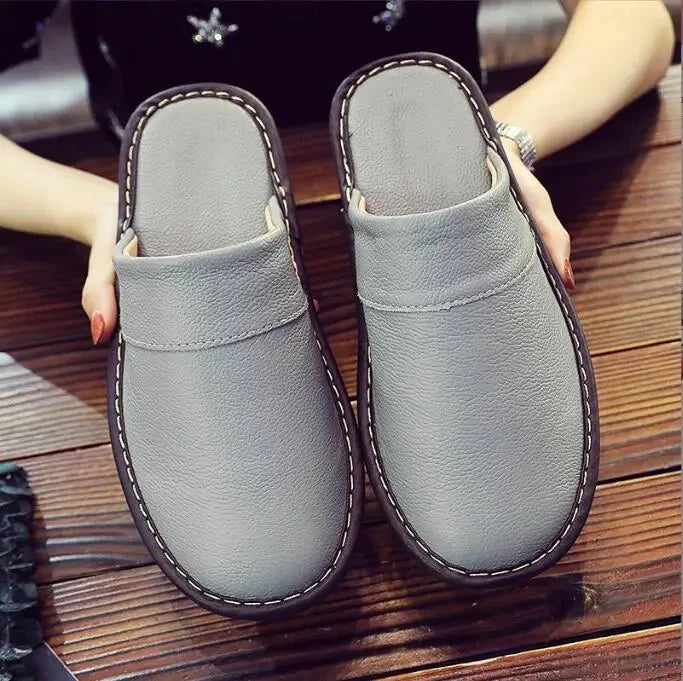 Unisex leather indoor slippers with non-slip soles from TrendLux Wear, available in EU sizes 35 to 46 for men and women.
