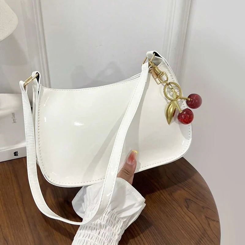 TrenLux Wear Women's Pure Leather Solid Colour Cherry Pendant  Bag TrenLux Wear
