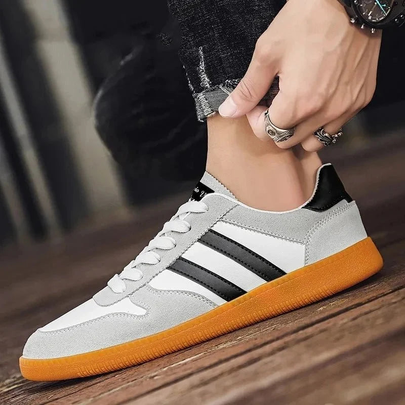 Men's thick-sole striped casual sneakers by TrendLux Wear featuring a stylish design and comfortable fit.
