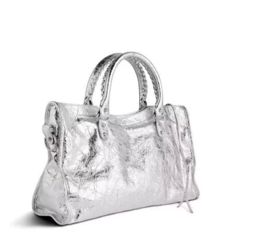 Women's motorcycle hobo handbag by TrendLux Wear with high capacity, luxury design, featuring sleek leather and stylish hardware.