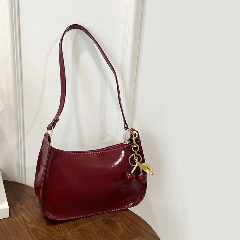 TrenLux Wear Women's Pure Leather Solid Colour Cherry Pendant  Bag TrenLux Wear