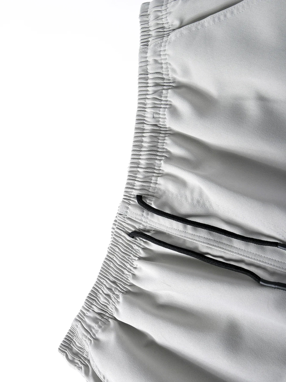 Men's tactical cargo pants by TrendLux Wear featuring multiple pockets and a loose fit, suitable for outdoor jogger and sweatpants styles.