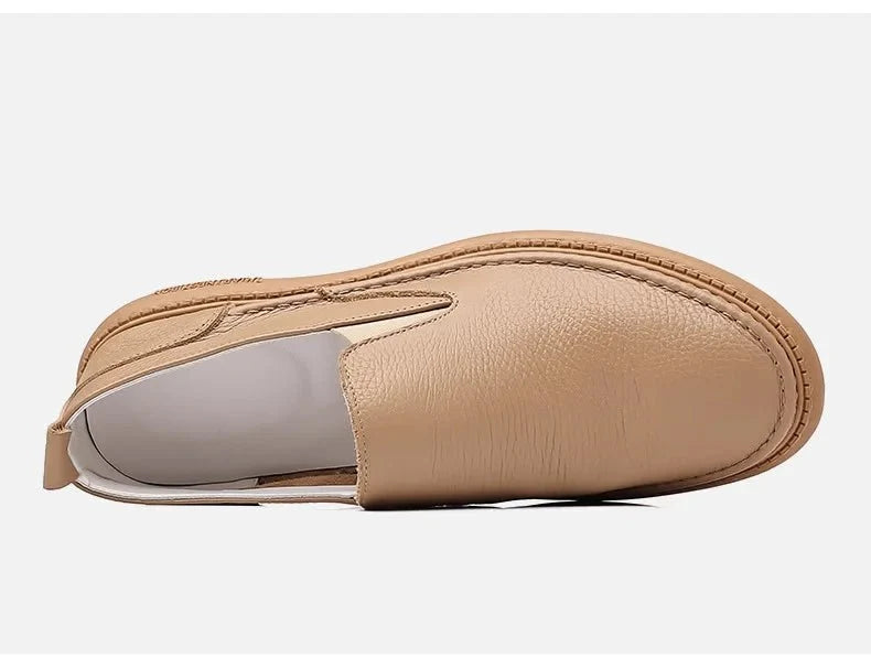 Men's genuine leather casual loafers by TrendLux Wear, slip-on flat shoes with breathable solid color design and comfortable fit.