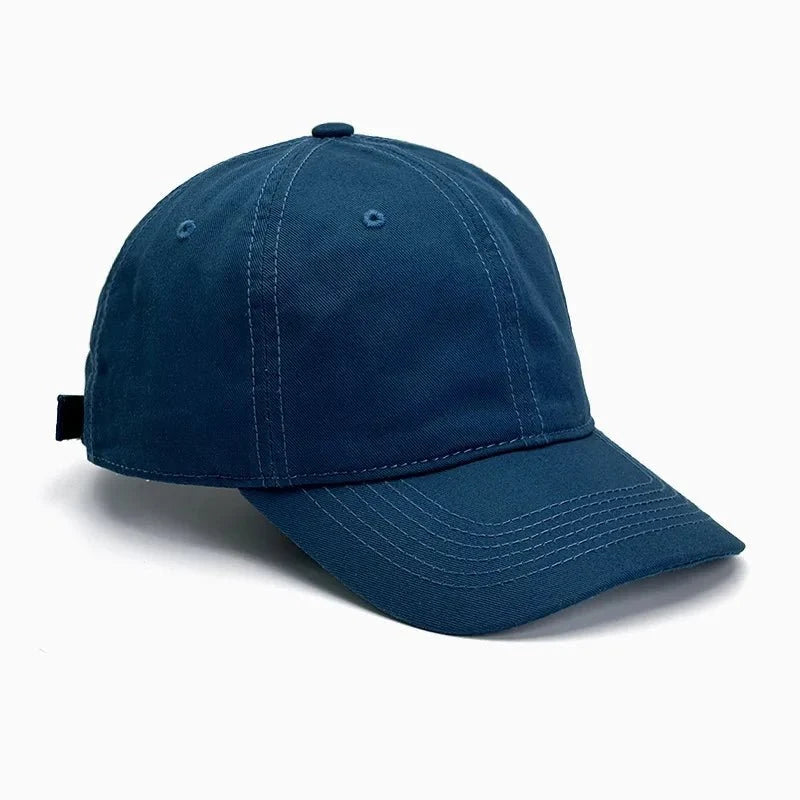 Unisex soft-top dad hat by TrendLux Wear, plain baseball cap with sun protection, shown in a neutral color.