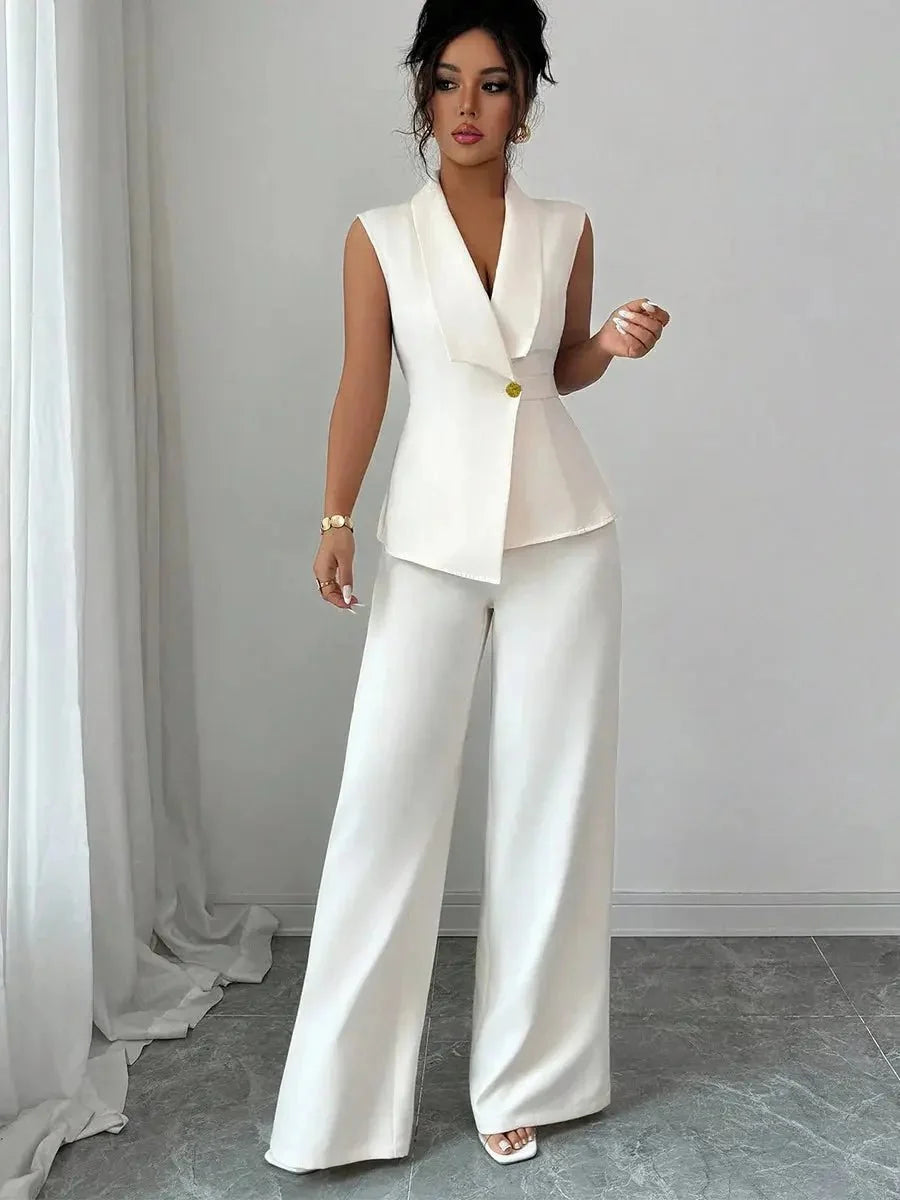 Women's spring sleeveless 2-piece suit by TrendLux Wear, featuring a stylish top and matching pants in a vibrant fabric.