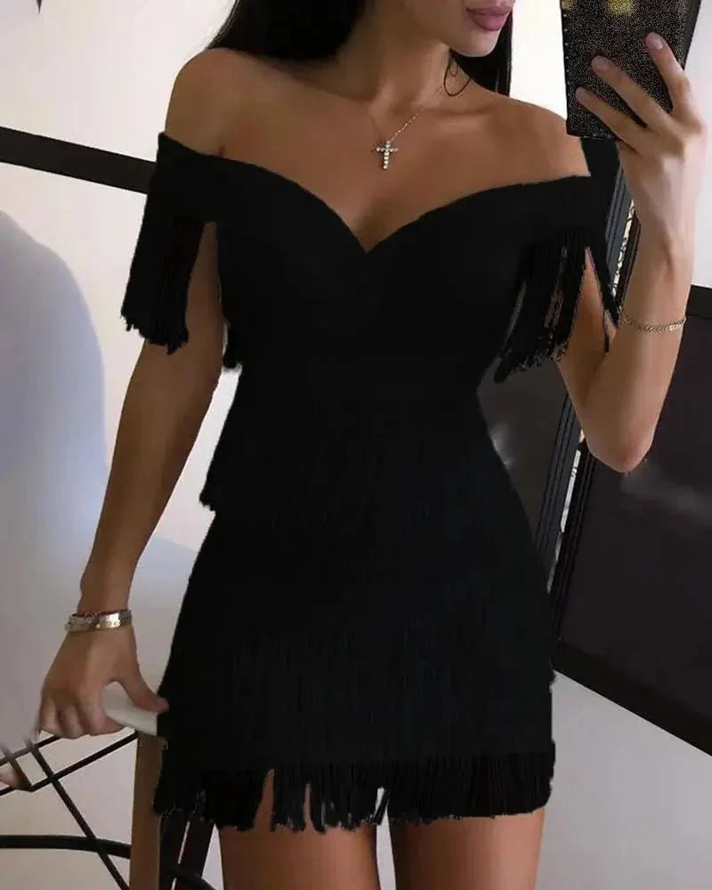 Black fringed one-shoulder mini dress by The Glow Sanctuary, stylish club dress with a bold, trendy design for night outs.