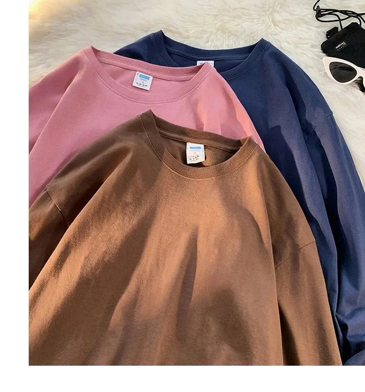 Unisex oversized long sleeve blank T-shirt by My Store 5 in black, featuring a casual streetwear style and relaxed fit.