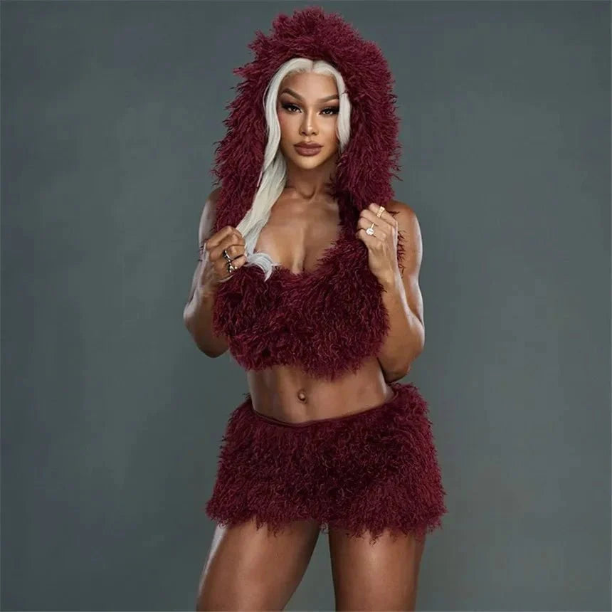 Women's faux fur 2-piece set by TrendLux Wear featuring a backless lace-up tank top and bodycon mini skirt.
