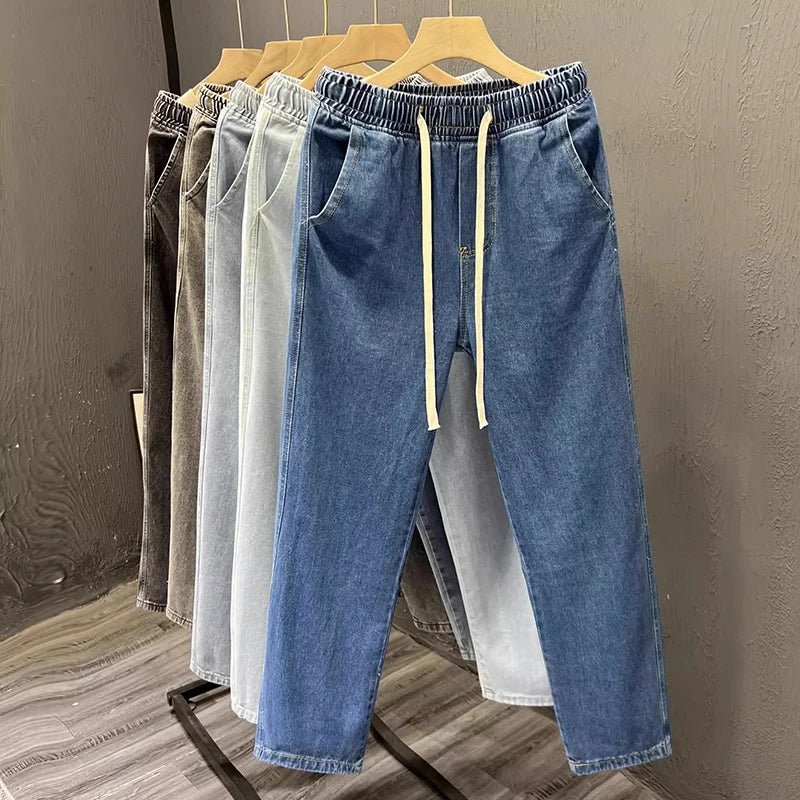 Men's vintage loose straight leg jeans by TrendLux Wear, made of durable cotton denim, perfect for casual spring and autumn wear.