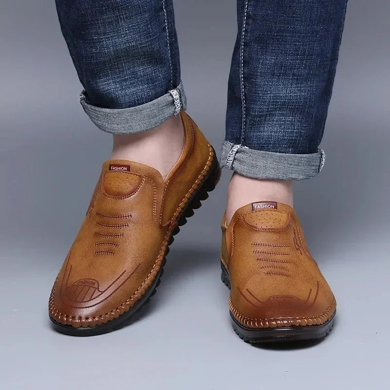 Men's handmade PU leather moccasin sneakers by TrendLux Wear featuring soft soles and breathable casual loafers for comfort.