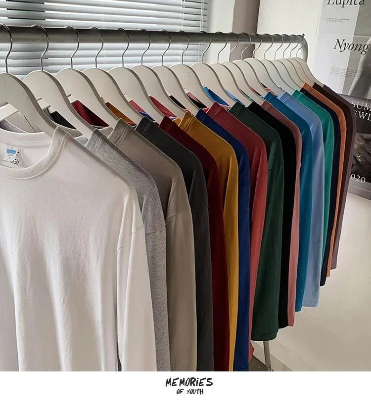 Unisex oversized long sleeve blank T-shirt from My Store 5, featuring a simple design in neutral color, available in various sizes.
