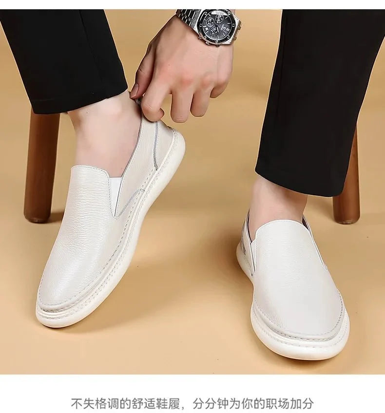 Men's genuine leather casual loafers by TrendLux Wear, breathable solid color slip-on flat shoes with a sleek, comfortable design.