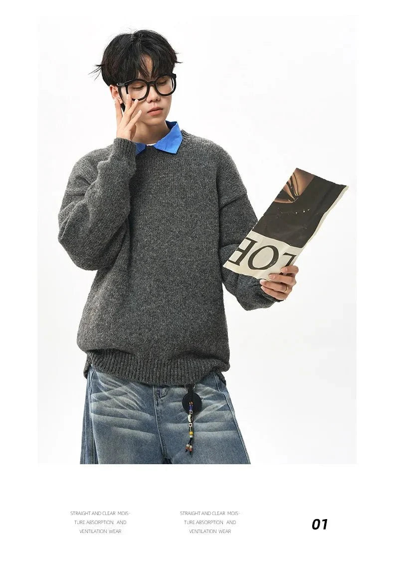 Men's oversized round neck pullover sweater by TrendLux Wear, warm polyester knit in three colors, shown in a cozy close-up.