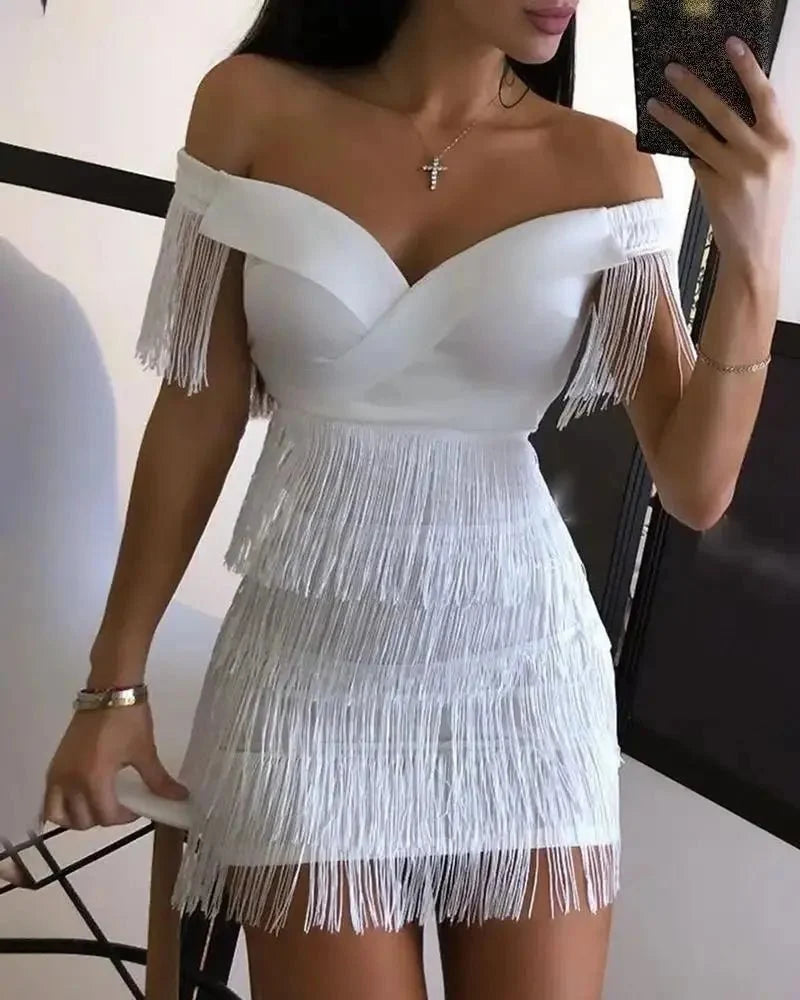 The Glow Sanctuary fringed one-shoulder mini dress for night out, featuring a stylish design with fringed details and a one-shoulder cut.