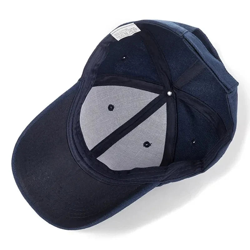 Unisex plain baseball cap by TrendLux Wear featuring adjustable structured fit in a neutral color.
