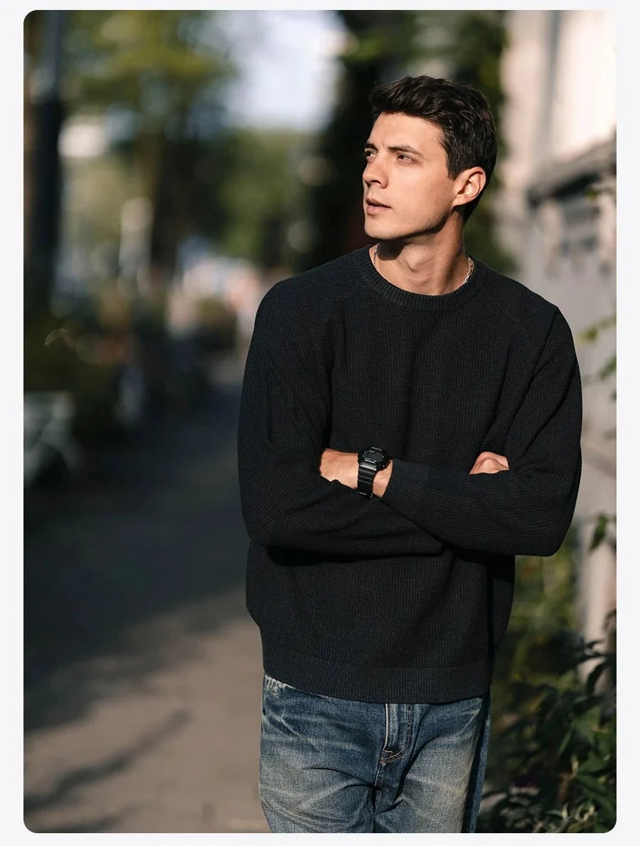 Men's oversized waffle-knit crewneck sweater in Heather Denim Blue by TrendLux Wear, casual pullover with textured knit fabric.
