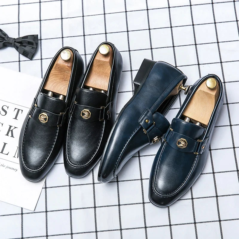 Men's casual slip-on loafers featuring a round toe, in black and navy PU leather with a gold metal buckle detail.
